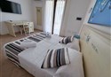 foto izba hotela Mimose Beach Village v Badesi na talianskom ostrove Sardinia