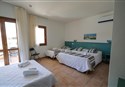 foto izba hotela Mimose Beach Village v Badesi na talianskom ostrove Sardinia